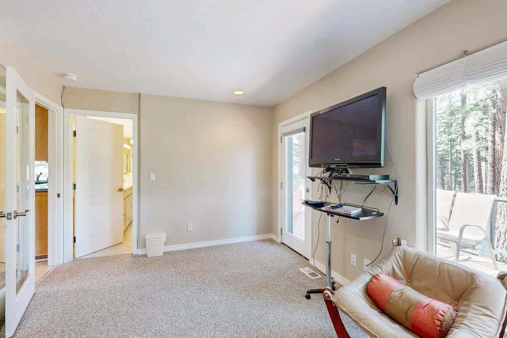 with private, scenic deck, heated driveway