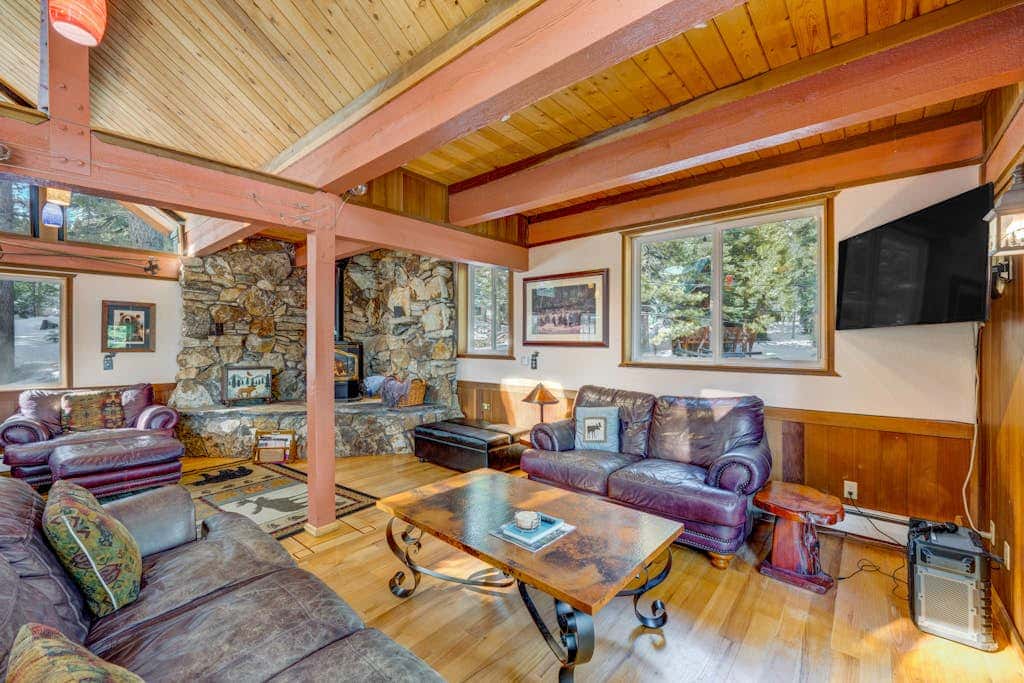 Dog-friendly cabin with private hot tub, fireplace, near skiing & the beach