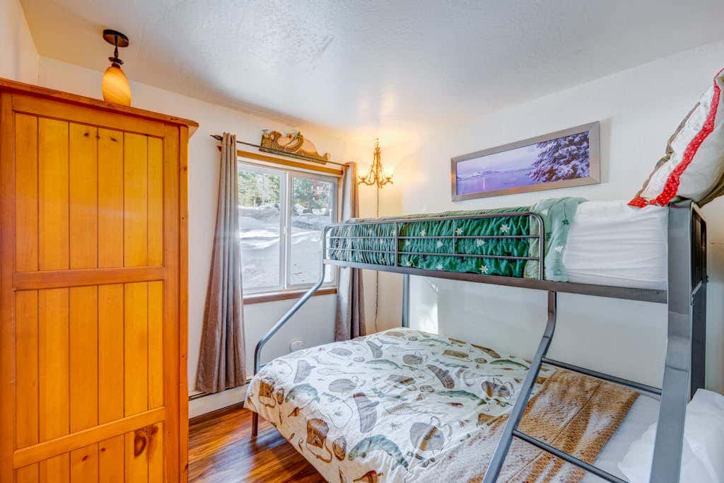 Dog-friendly cabin with private hot tub, fireplace, near skiing & the beach