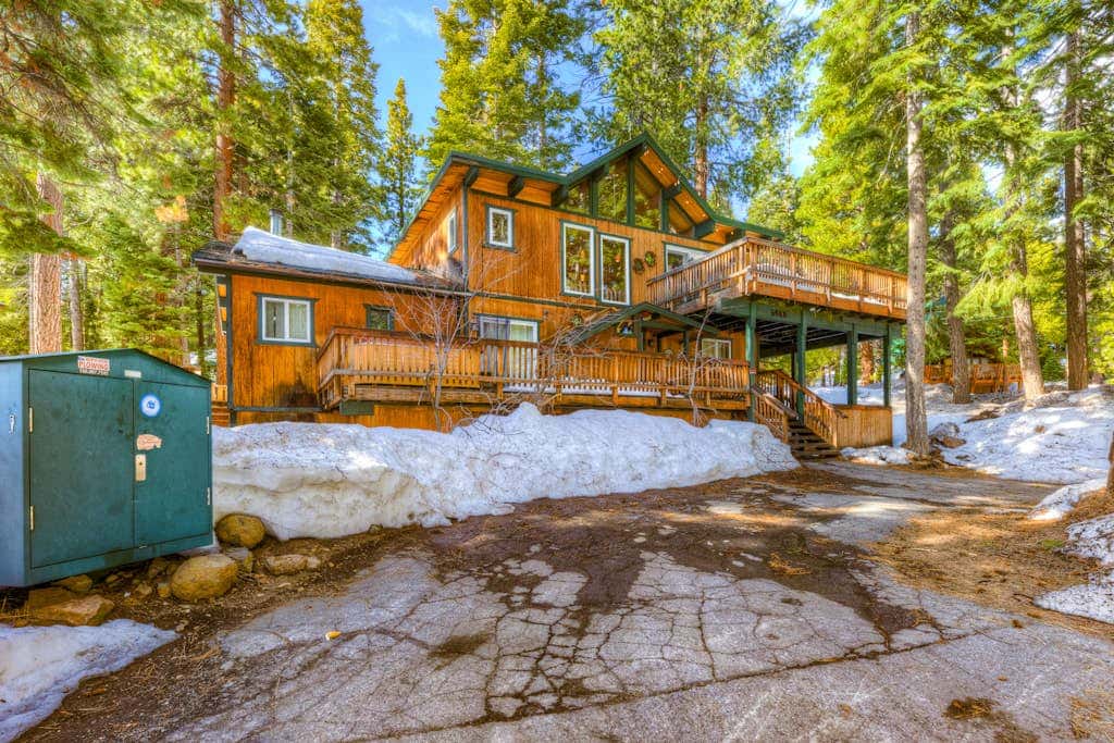 Dog-friendly cabin with private hot tub, fireplace, near skiing & the beach
