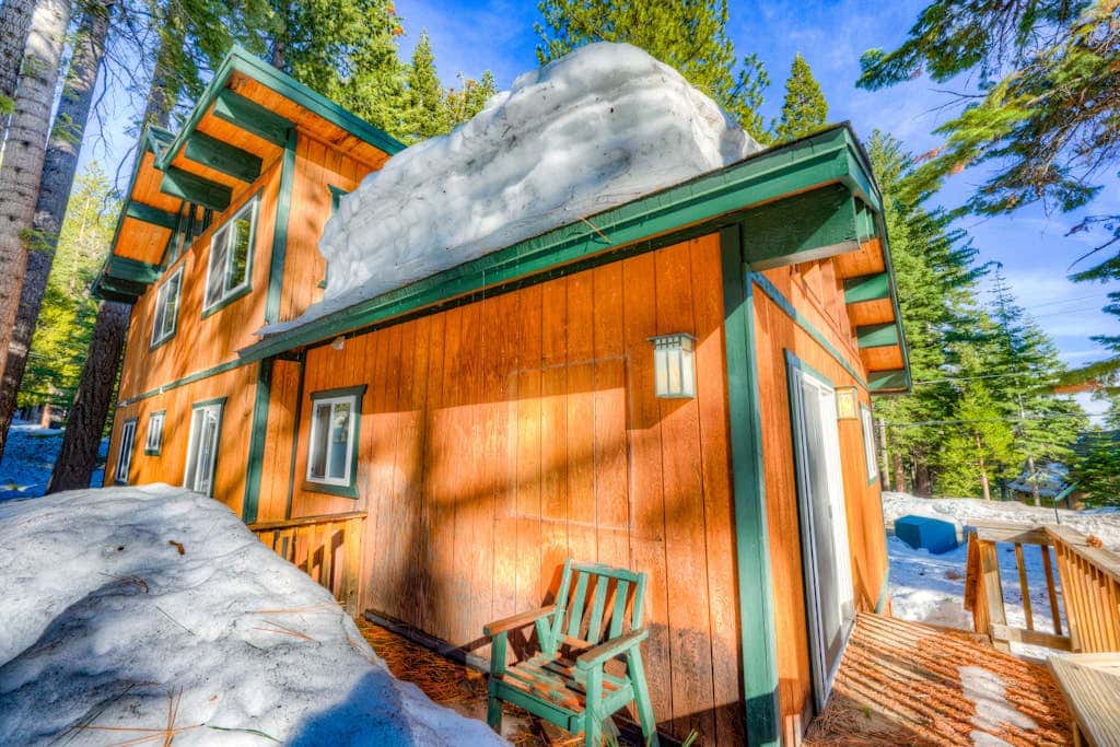 Dog-friendly cabin with private hot tub, fireplace, near skiing & the beach