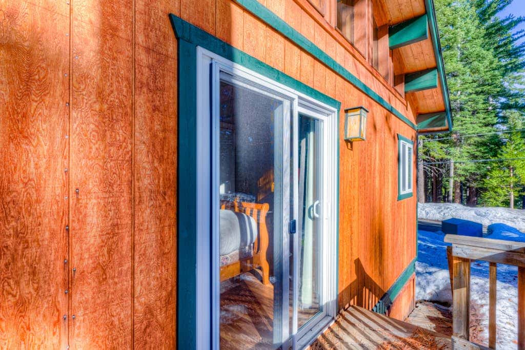 Dog-friendly cabin with private hot tub, fireplace, near skiing & the beach