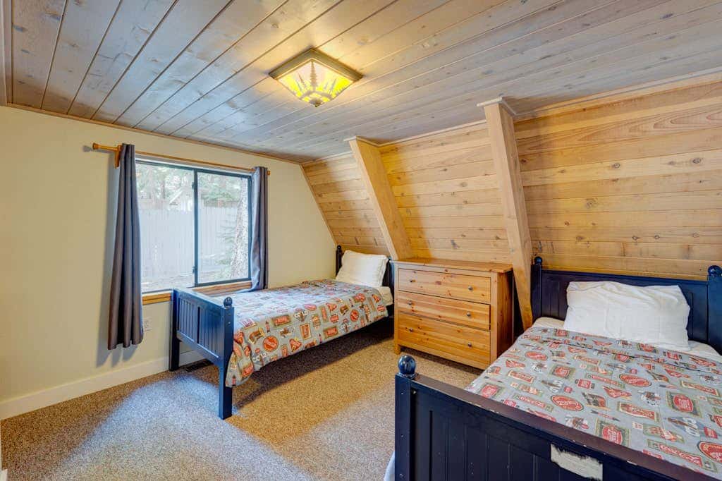 A-frame home with large deck, game room, wood fireplace & near the lake - dogs ok