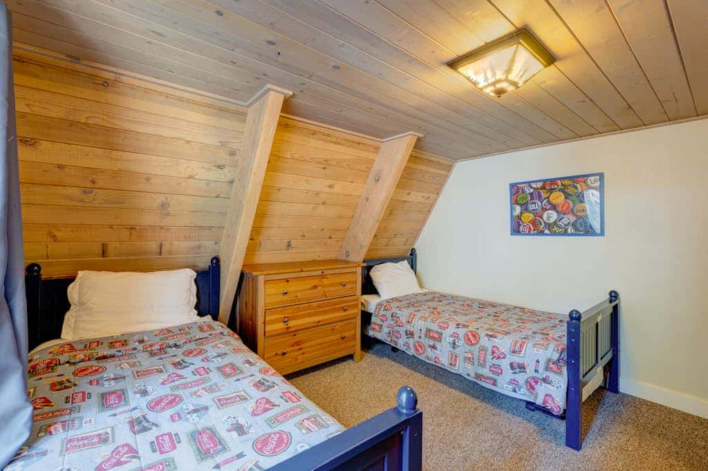 A-frame home with large deck, game room, wood fireplace & near the lake - dogs ok