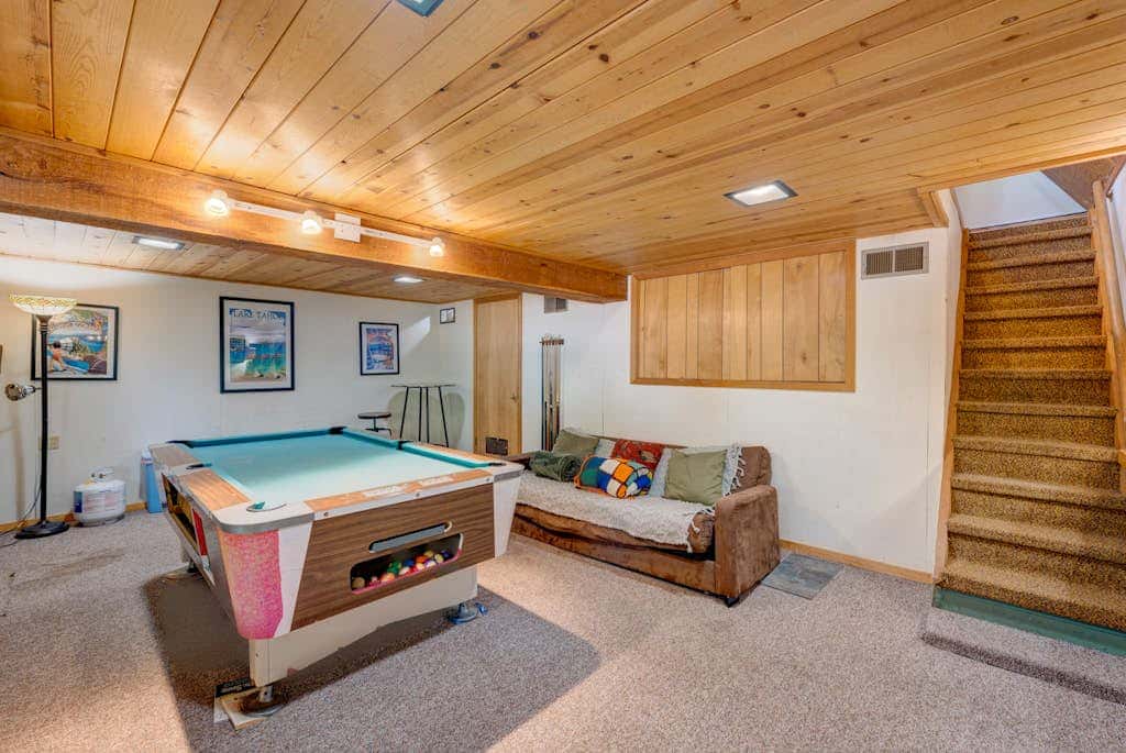 A-frame home with large deck, game room, wood fireplace & near the lake - dogs ok