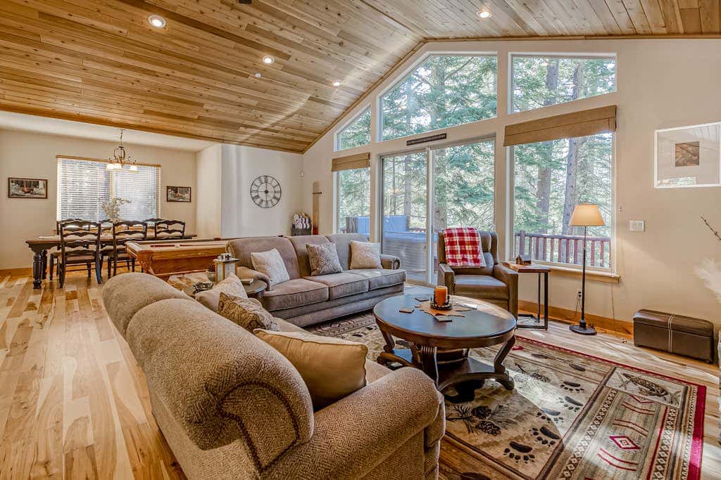 Inviting spacious home with fireplace, deck, hot tub, full kitchen, & W&D