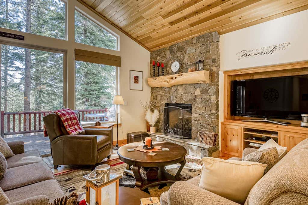 Inviting spacious home with fireplace, deck, hot tub, full kitchen, & W&D