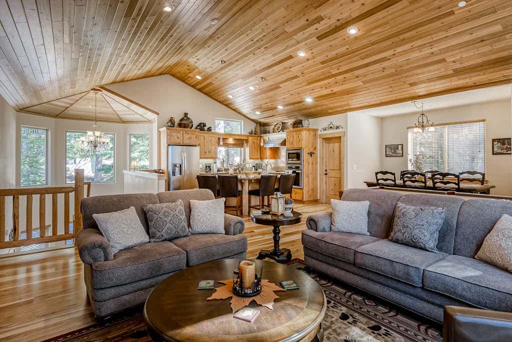Inviting spacious home with fireplace, deck, hot tub, full kitchen, & W&D
