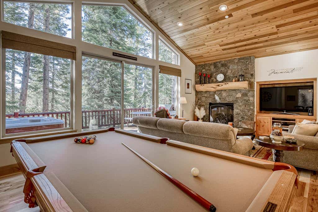 Inviting spacious home with fireplace, deck, hot tub, full kitchen, & W&D