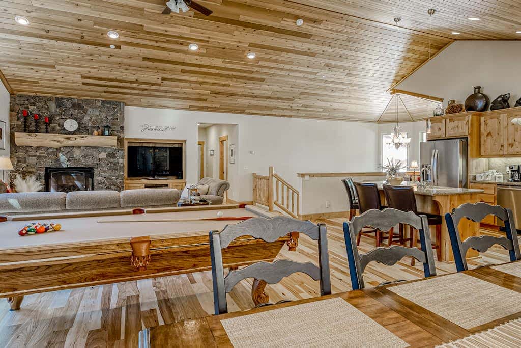 Inviting spacious home with fireplace, deck, hot tub, full kitchen, & W&D
