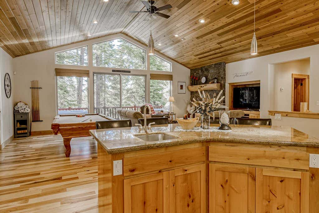 Inviting spacious home with fireplace, deck, hot tub, full kitchen, & W&D