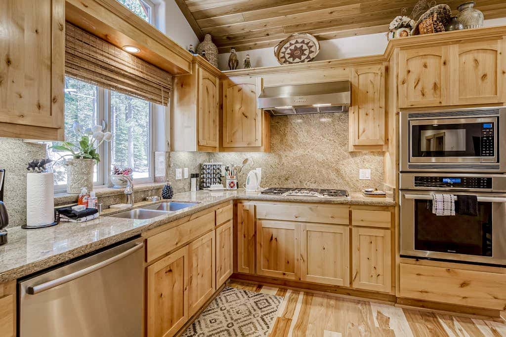 Inviting spacious home with fireplace, deck, hot tub, full kitchen, & W&D