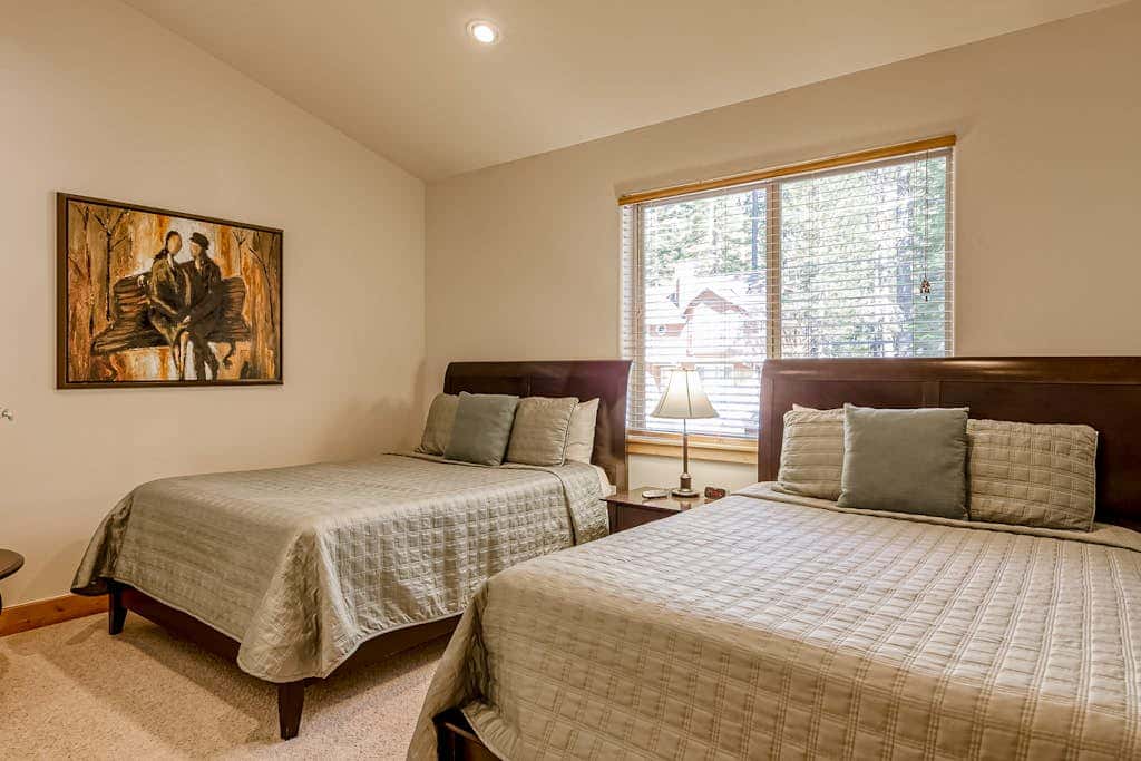 Inviting spacious home with fireplace, deck, hot tub, full kitchen, & W&D