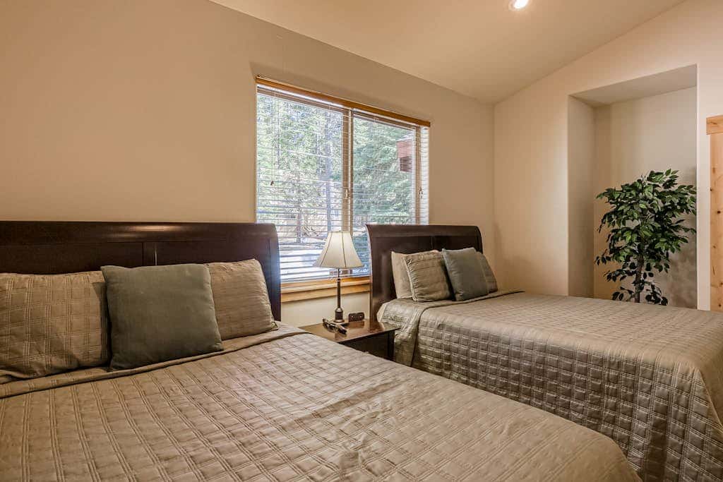 Inviting spacious home with fireplace, deck, hot tub, full kitchen, & W&D