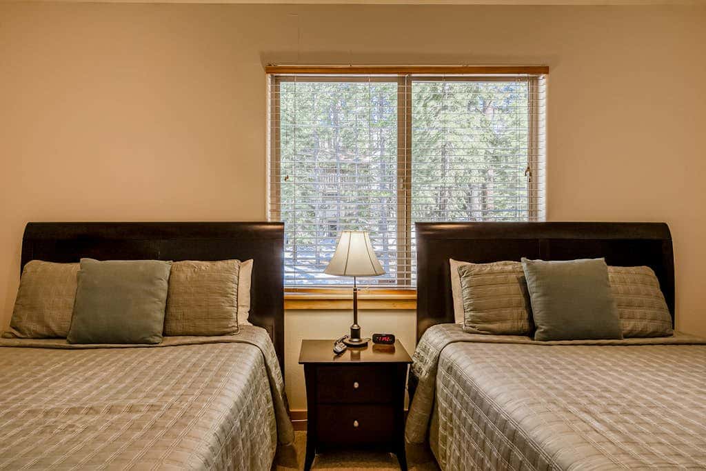 Inviting spacious home with fireplace, deck, hot tub, full kitchen, & W&D