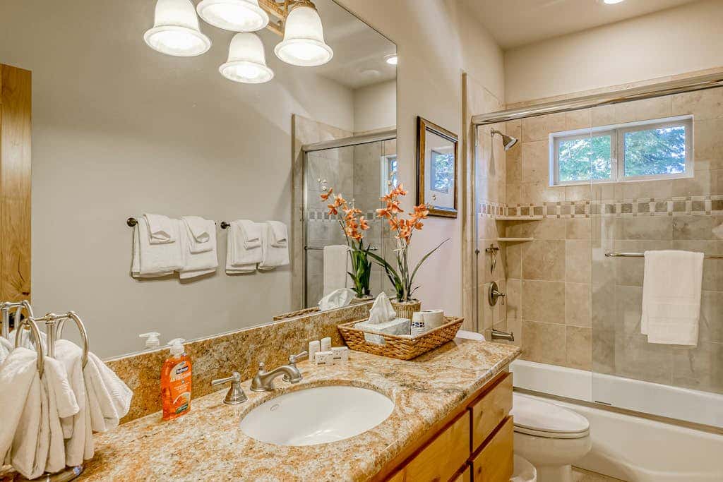 Inviting spacious home with fireplace, deck, hot tub, full kitchen, & W&D