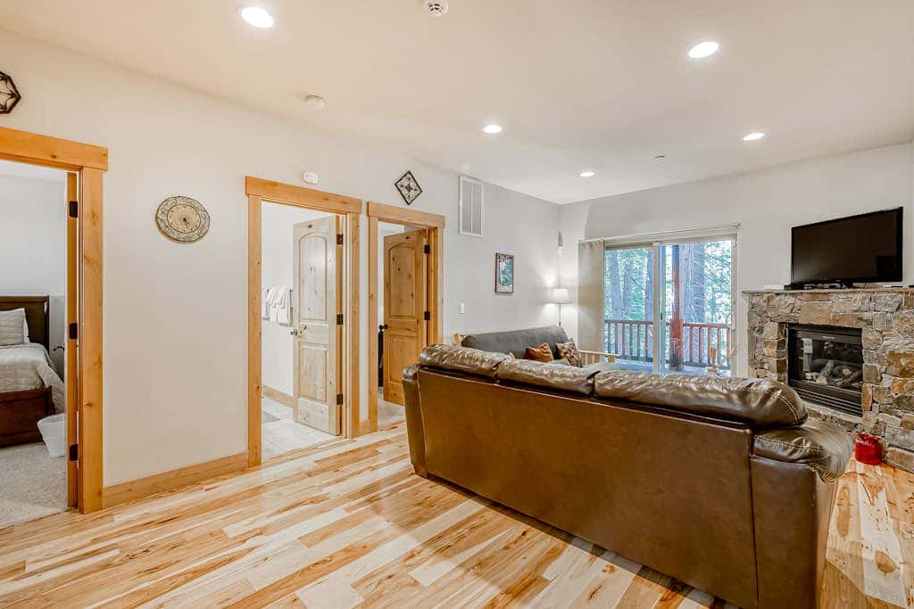 Inviting spacious home with fireplace, deck, hot tub, full kitchen, & W&D