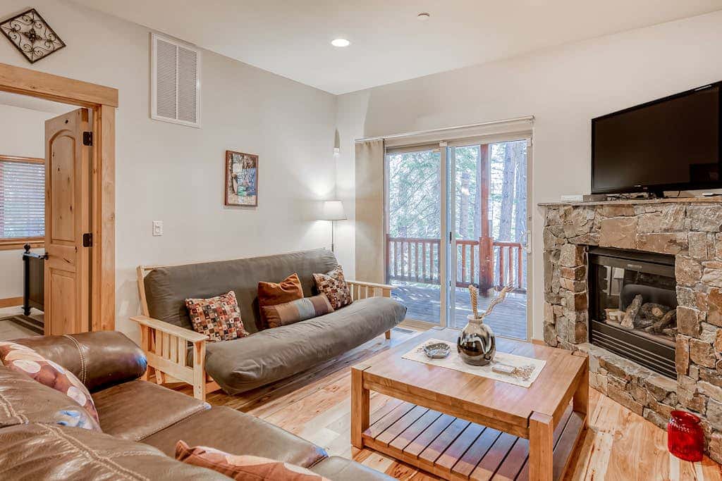 Inviting spacious home with fireplace, deck, hot tub, full kitchen, & W&D