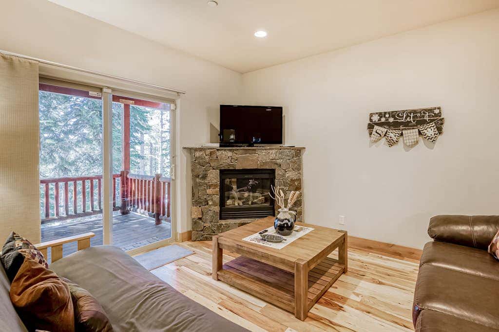 Inviting spacious home with fireplace, deck, hot tub, full kitchen, & W&D