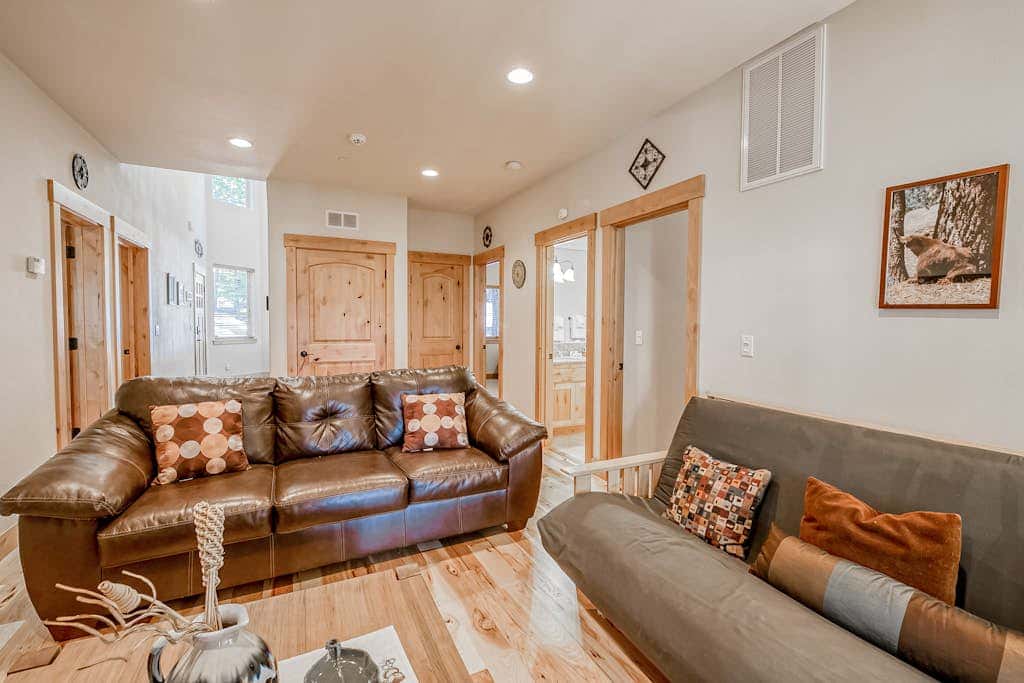 Inviting spacious home with fireplace, deck, hot tub, full kitchen, & W&D