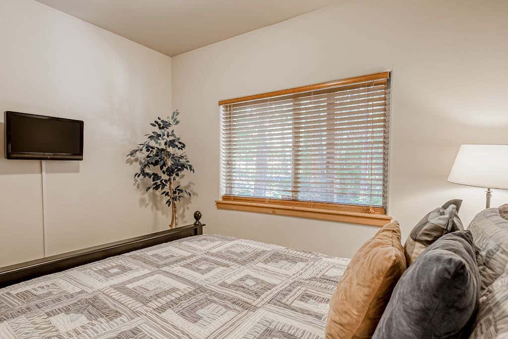 Inviting spacious home with fireplace, deck, hot tub, full kitchen, & W&D