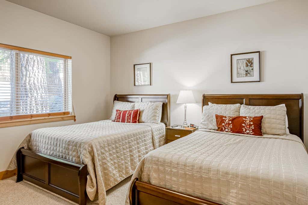 Inviting spacious home with fireplace, deck, hot tub, full kitchen, & W&D