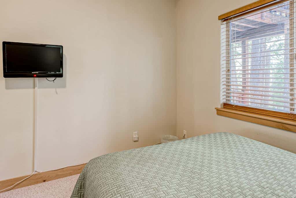 Inviting spacious home with fireplace, deck, hot tub, full kitchen, & W&D