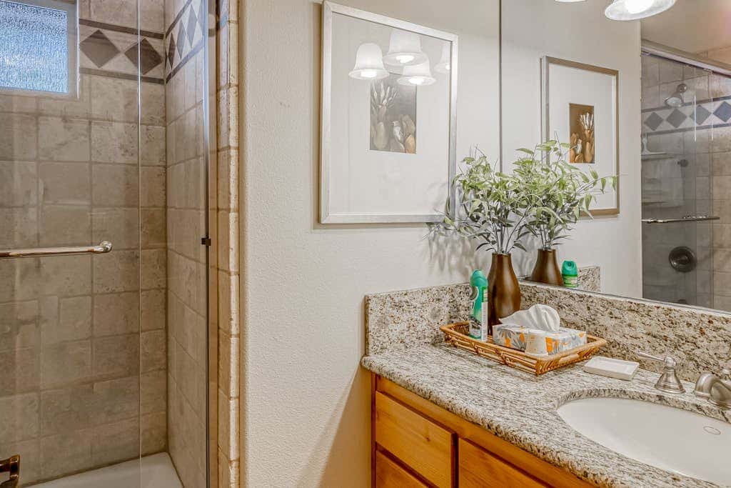 Inviting spacious home with fireplace, deck, hot tub, full kitchen, & W&D