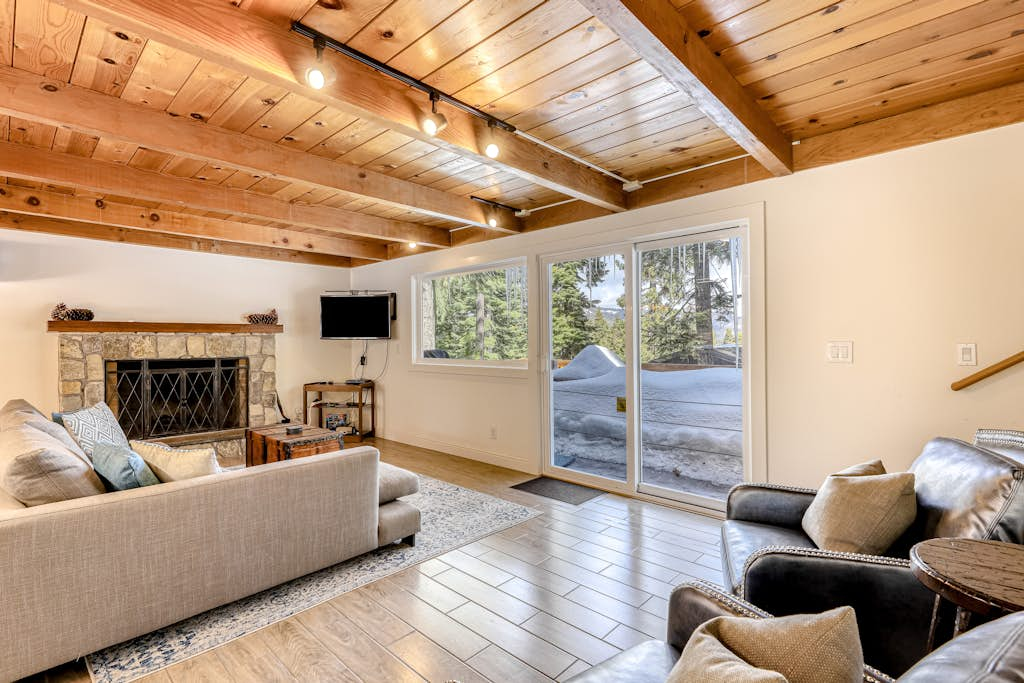 Classic Tahoe cabin charm with partial lake views, Chamberlands amenities, and year-round adventure just minutes away.