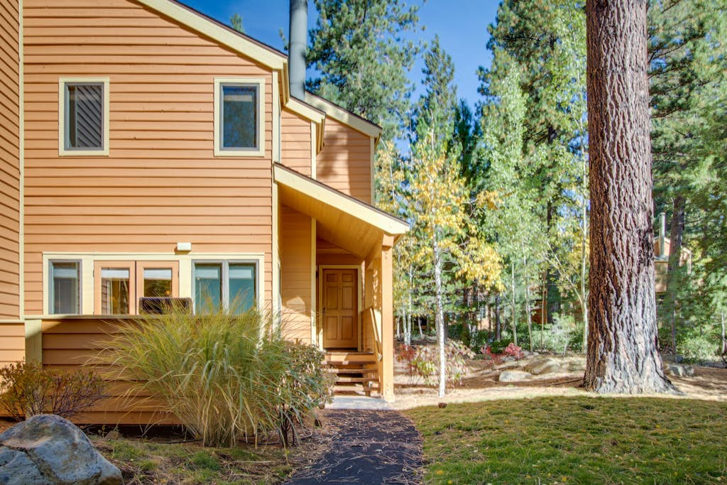 Stylish Townhome with Deck & Shared Hot Tub - Walk to Beaches, Near Skiing