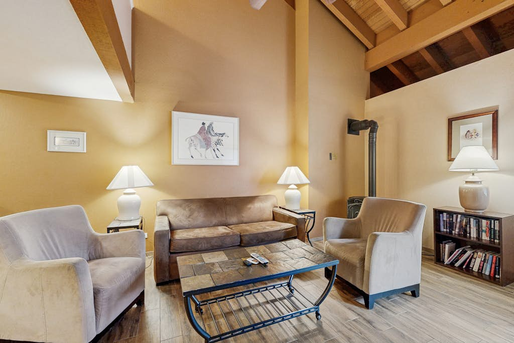 Third-floor condo with loft, hot tub, heated outdoor pool, WiFi, & fireplace