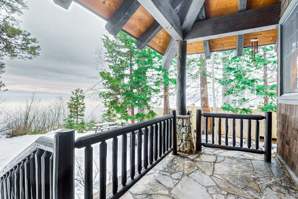 Beautiful lakefront home with dock, stone fireplace, W&D, and nearby activities