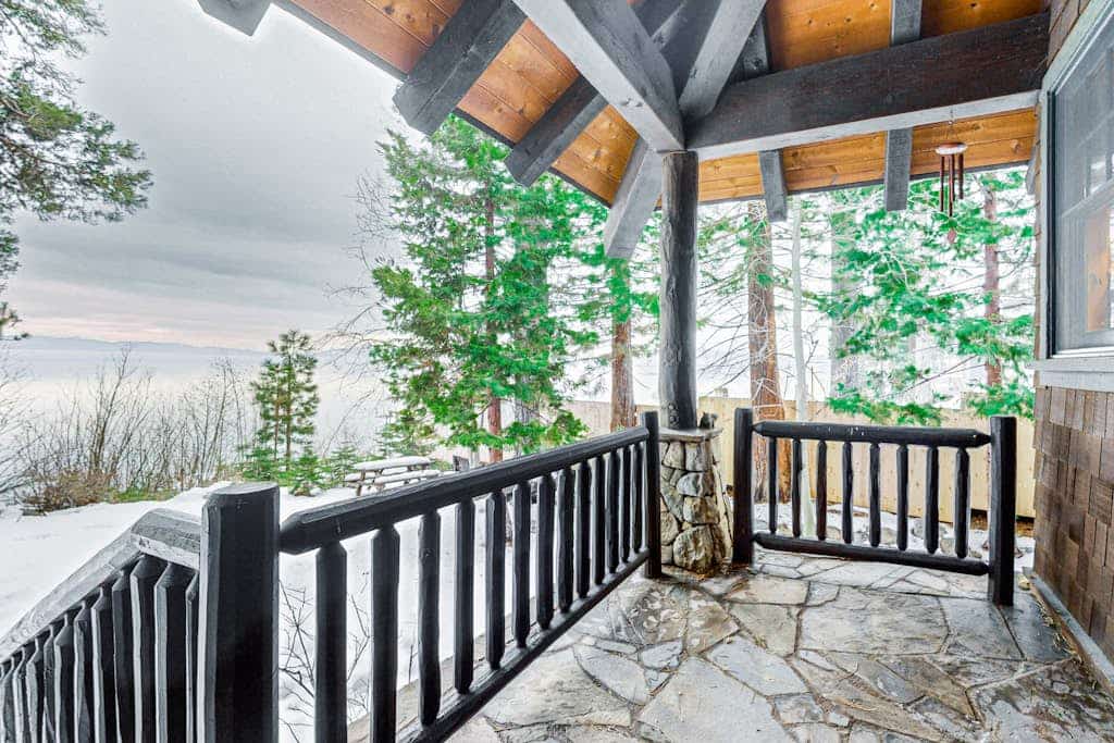 Beautiful lakefront home with dock, stone fireplace, W&D, and nearby activities