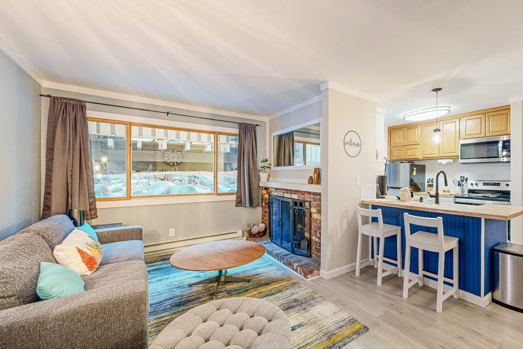 Condo with private beach, pool access, fireplace, WiFi, and nearby amenities