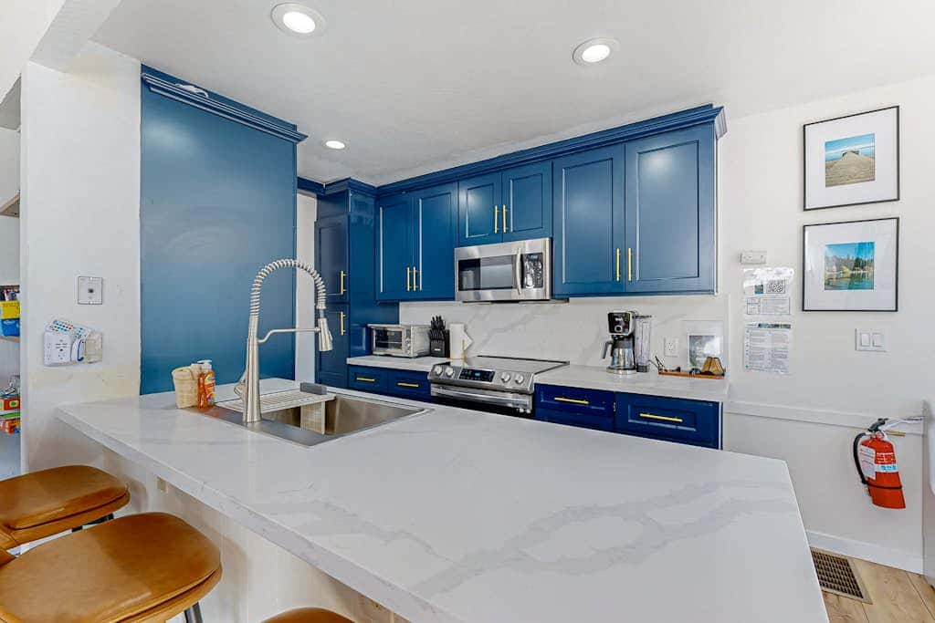Beautiful condo with modern appliances, two decks, and shared pool