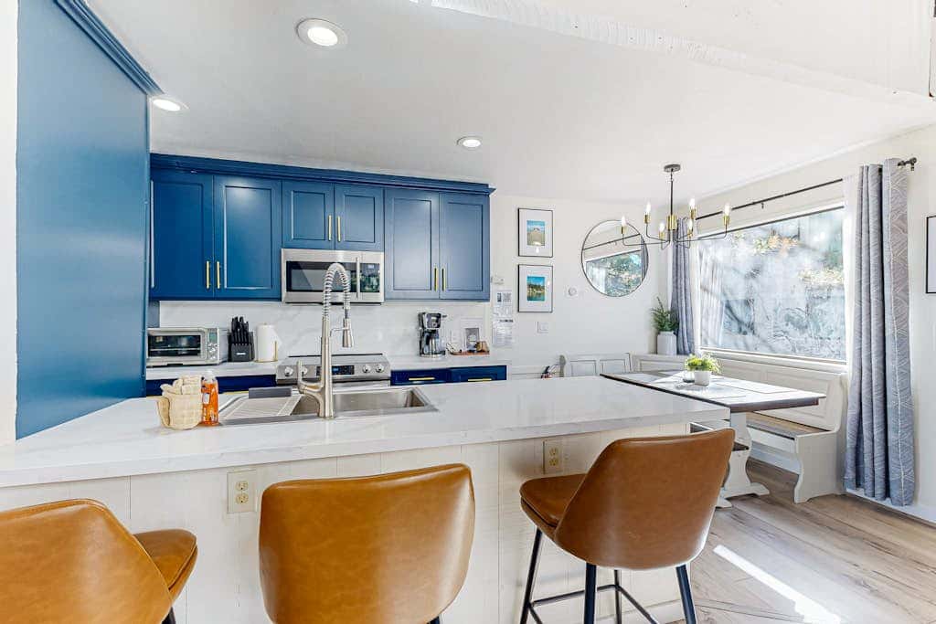Beautiful condo with modern appliances, two decks, and shared pool