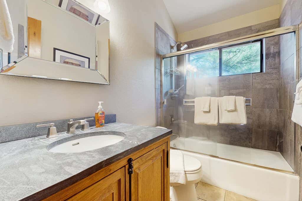 Remodeled house with private hot tub, pool access, tennis, & Ping-Pong