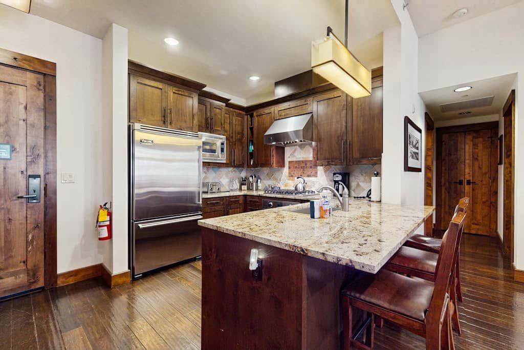 Ski-in-ski-out, ground-floor condo with fireplace, patio, shared pool & hot tub