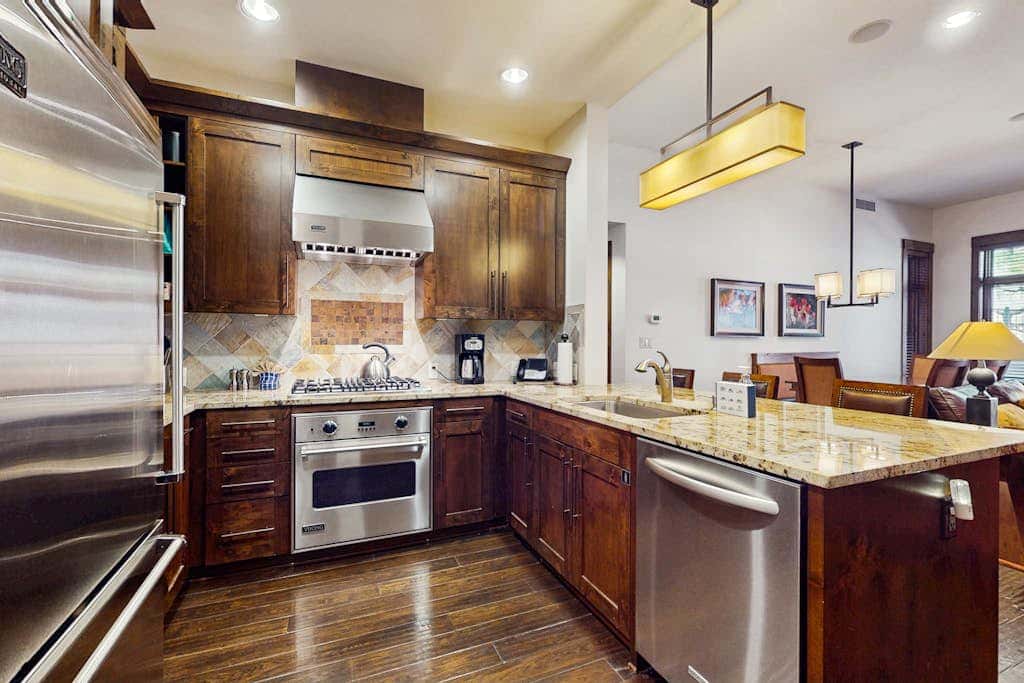 Ski-in-ski-out, ground-floor condo with fireplace, patio, shared pool & hot tub