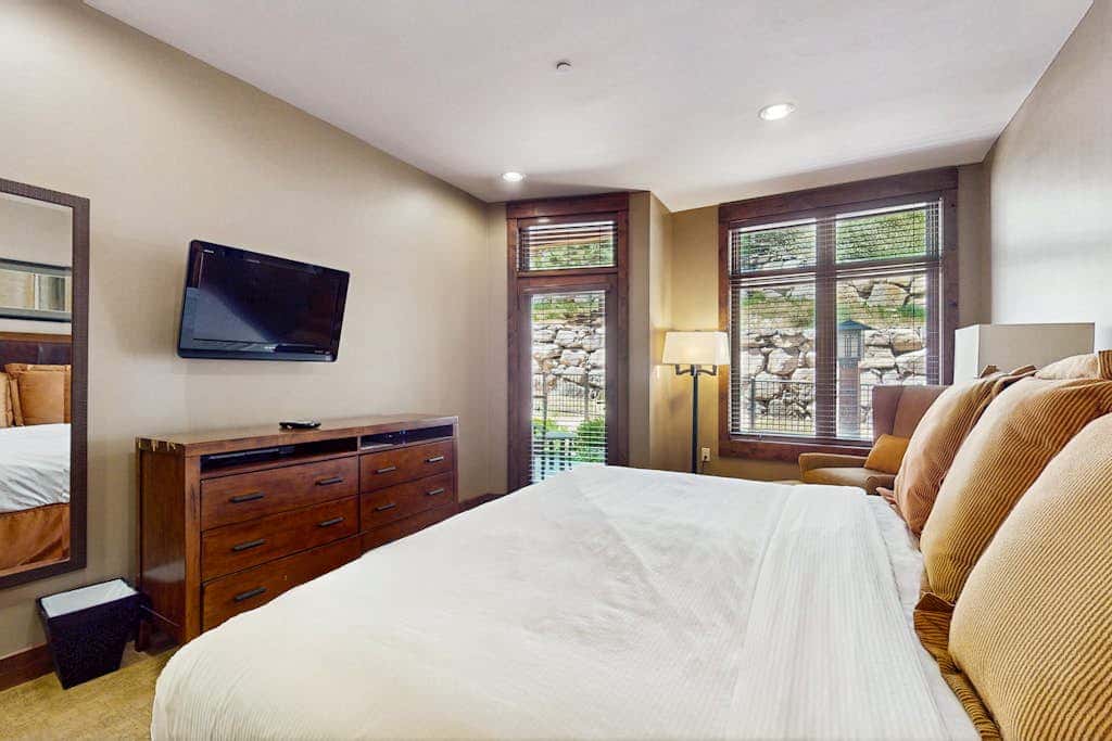 Ski-in-ski-out, ground-floor condo with fireplace, patio, shared pool & hot tub