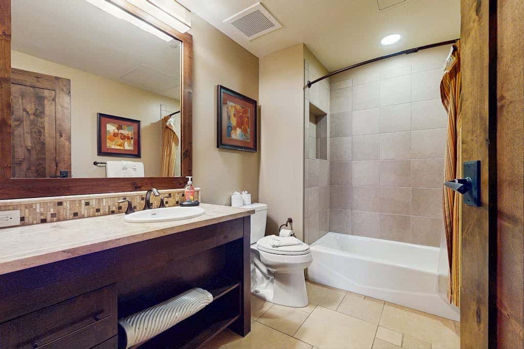 Ski-in-ski-out, ground-floor condo with fireplace, patio, shared pool & hot tub
