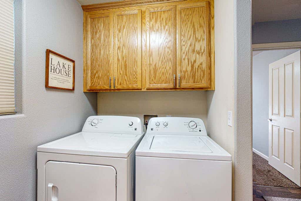 Cozy, enchanting retreat with hot tub, stunning deck, & balcony - close to beach