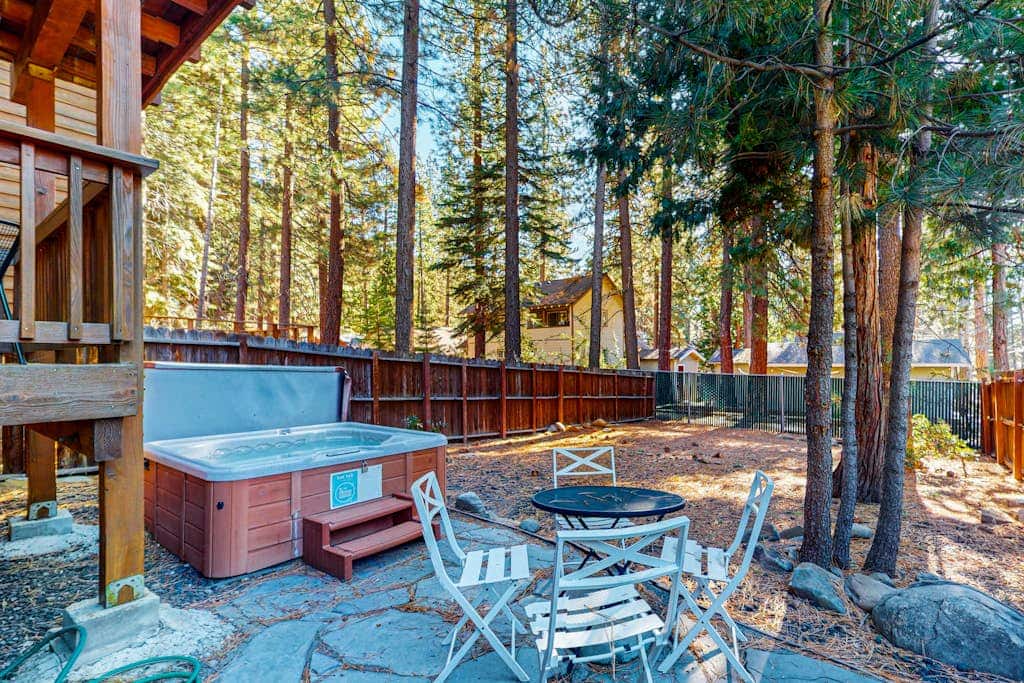 Cozy, enchanting retreat with hot tub, stunning deck, & balcony - close to beach
