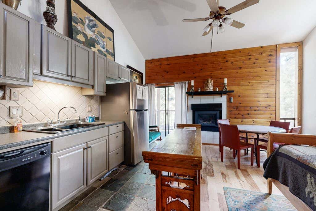Eclectic second floor condo with loft, balcony, & gas fireplace - family friendly