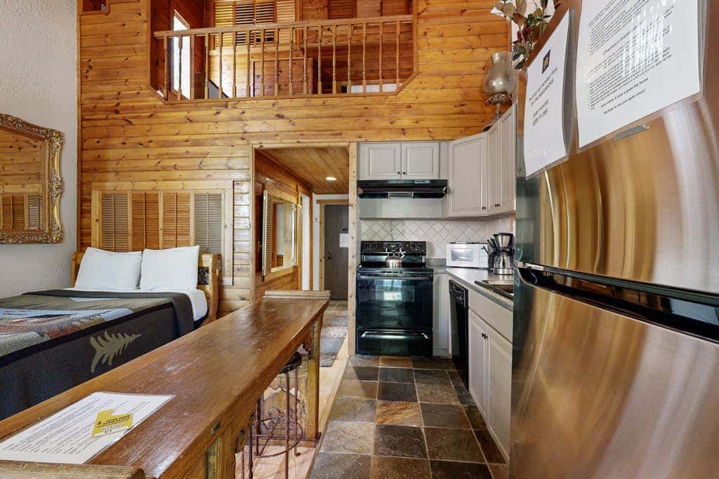 Eclectic second floor condo with loft, balcony, & gas fireplace - family friendly