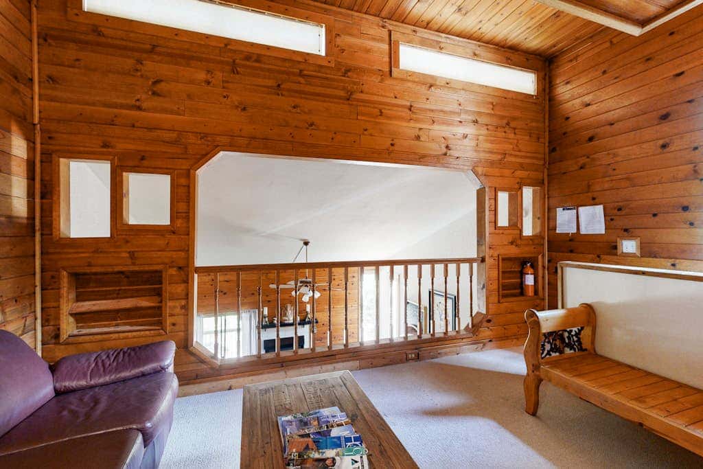Eclectic second floor condo with loft, balcony, & gas fireplace - family friendly