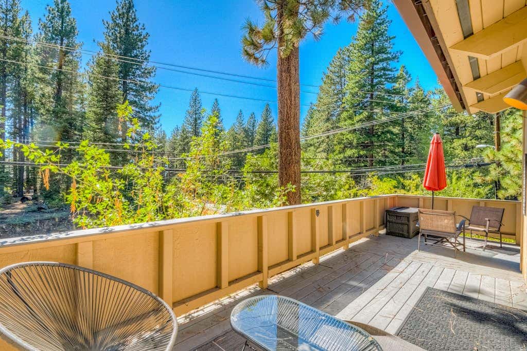 Two-story mountain-view condo with balcony, fireplace & pool - dog-friendly