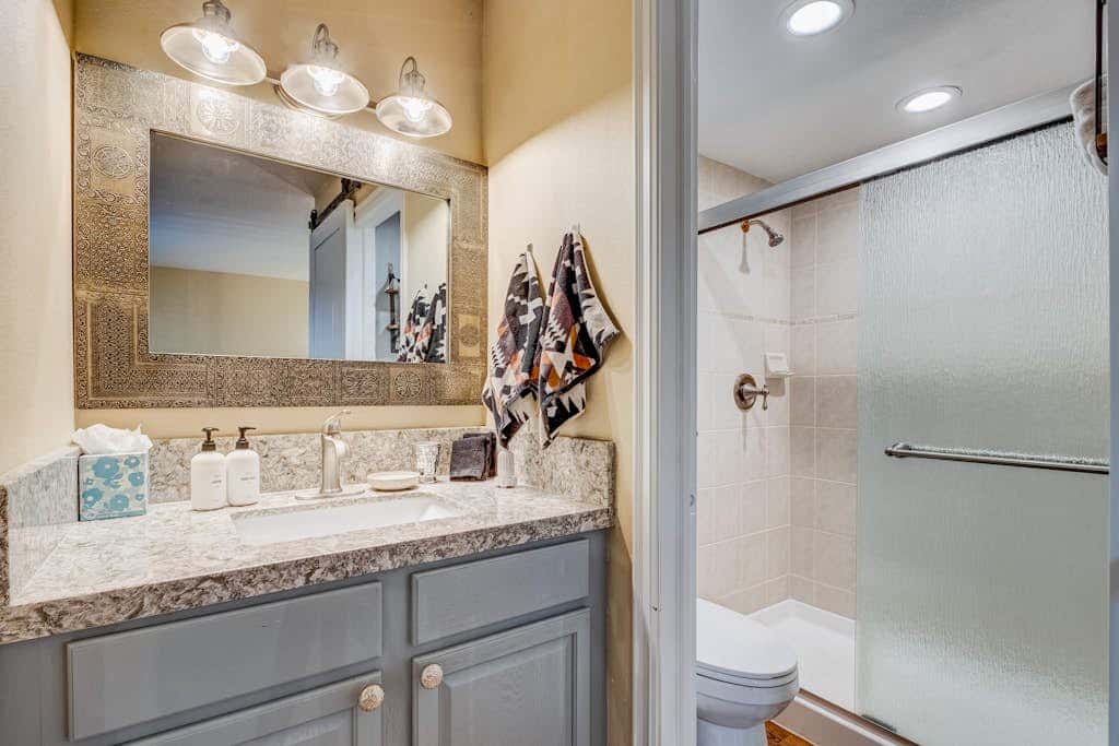 Two-story mountain-view condo with balcony, fireplace & pool - dog-friendly