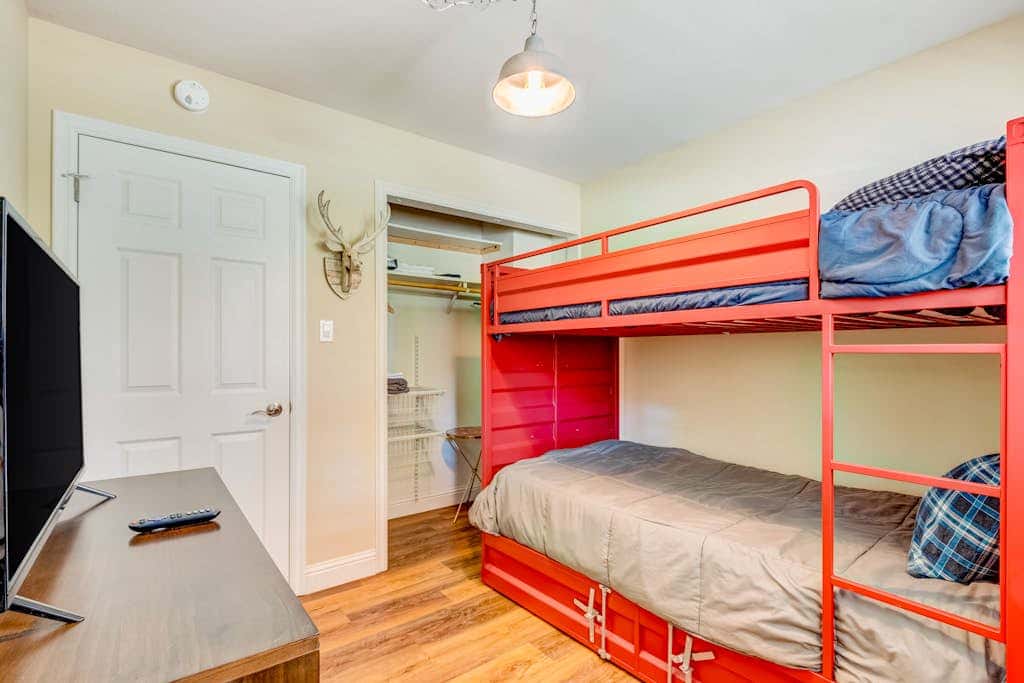 Two-story mountain-view condo with balcony, fireplace & pool - dog-friendly