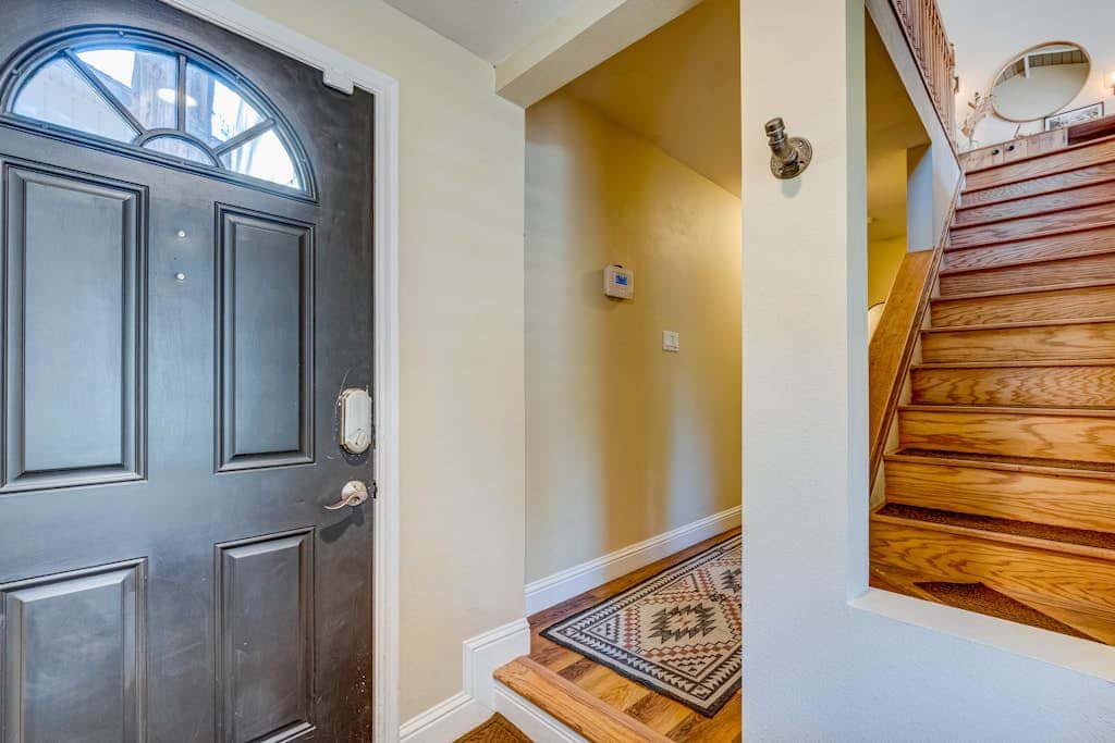 Two-story mountain-view condo with balcony, fireplace & pool - dog-friendly